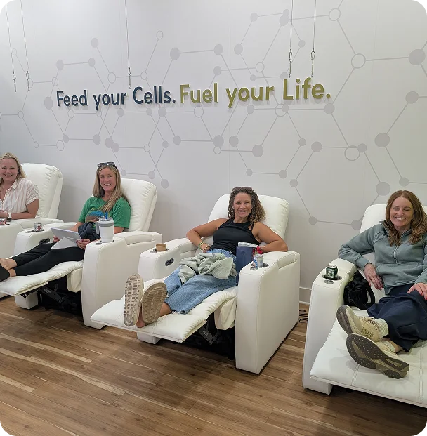 Four guests relaxing in recliners during their IV drips at the Lee’s Summit clinic